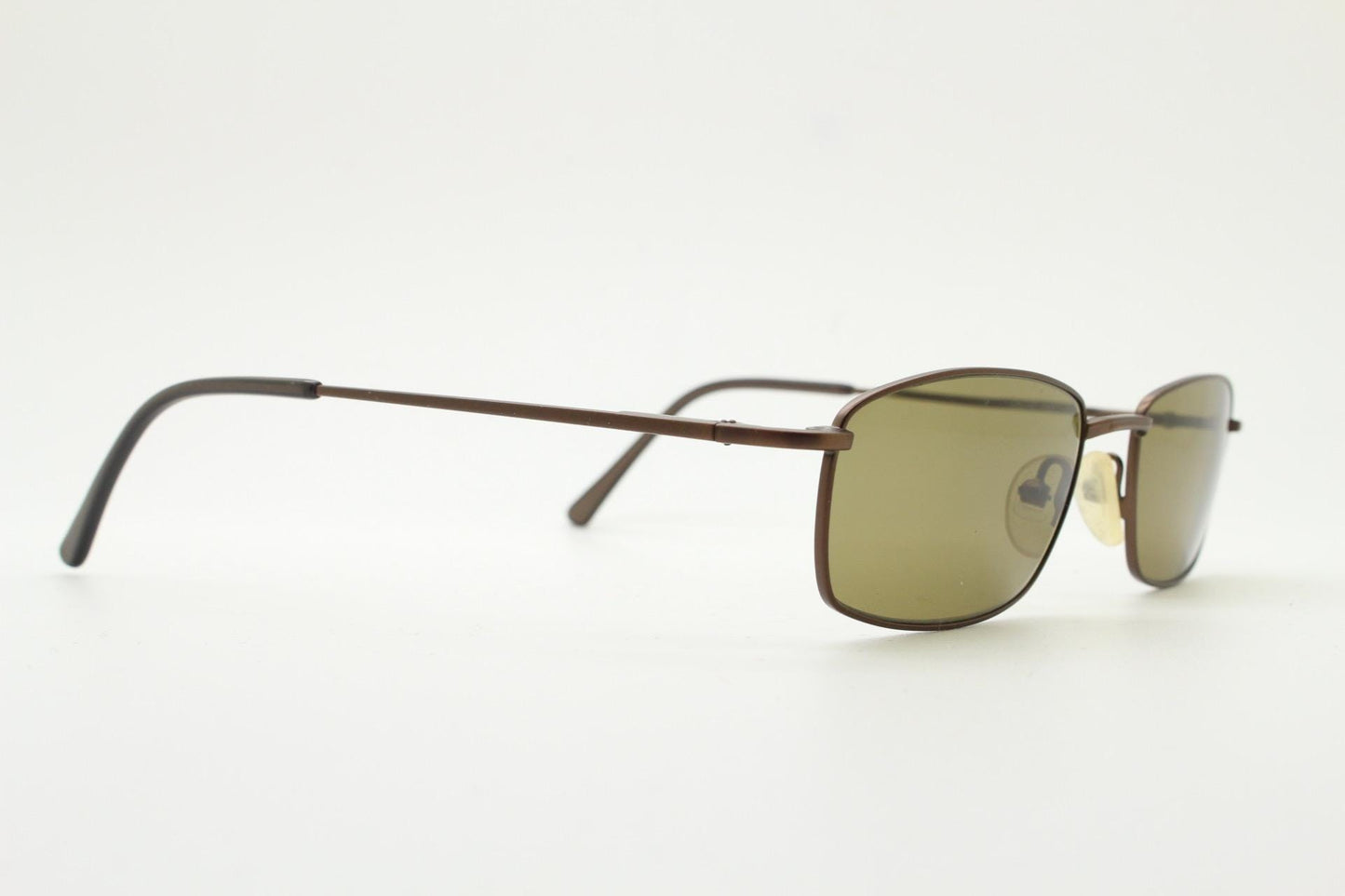 90s vintage rectangular low profile metal sunglasses. Minimal slim metal frame in satin bronze finish with plain brown lenses. NOS. BNWT