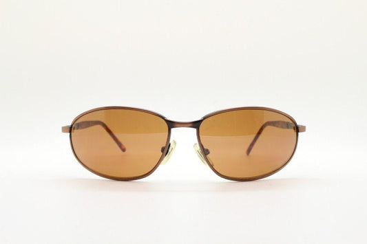 Y2K vintage small bug eye aviator sunglasses. Curved copper brushed finish solid metal frame with tortoise arms. Unused 2000s NOS