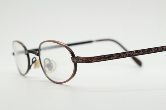 Paris Ma 90s vintage small oval eye glasses. Brushed copper finish optical frames with ornate details. Prescription steampunk spectacles NOS