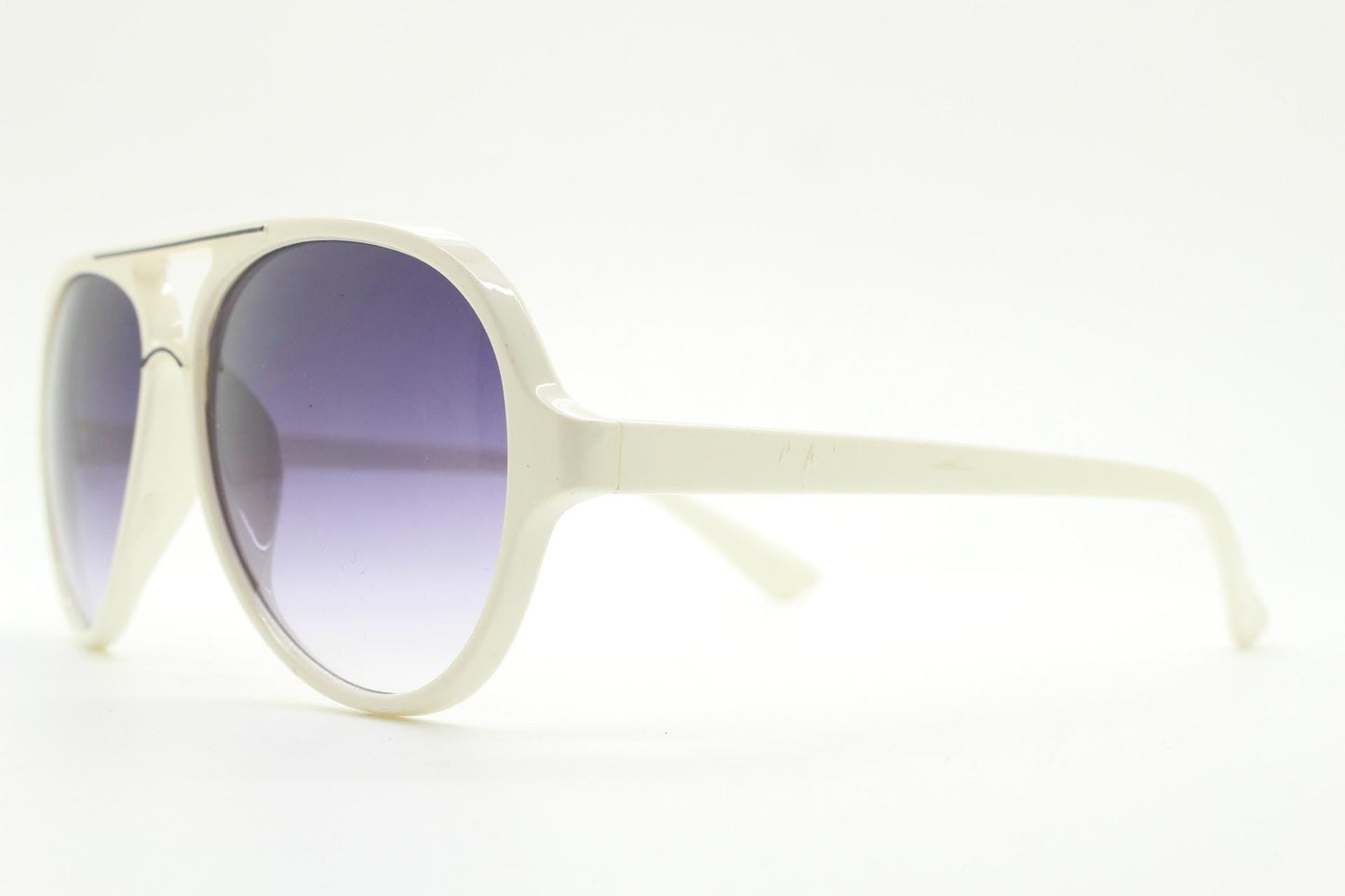 Y2K vintage teardrop aviator sunglasses. 2000's ice white frame with graduating black lenses and bridge outline. 80s design NOS aviators