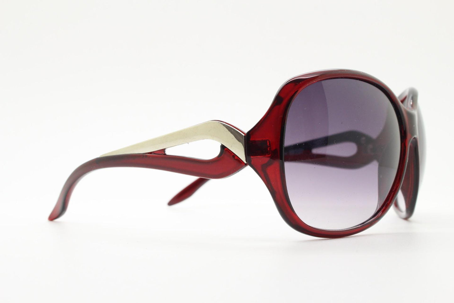 Y2k vintage oversized womens sunglasses. Big bug eye 70s design in deep red with metal arm detail. Authentic 2000s retro. NOS