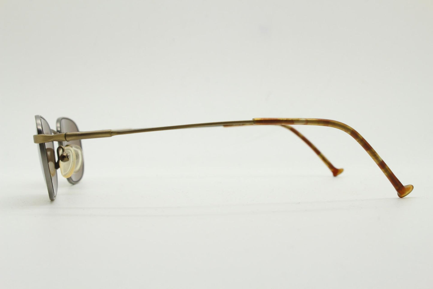 90s vintage small rectangular low profile metal sunglasses. Minimal slim frame in satin bronze finish with plain brown lenses. NOS. BNWT