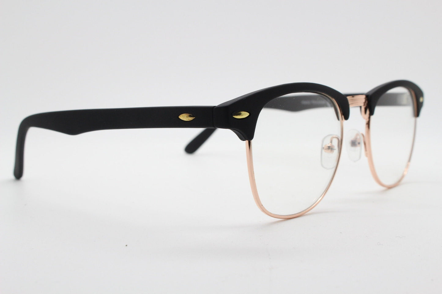 90s vintage browline sunglasses. All time classic design in black gloss finish with gold half rim. 50s, 60s. Unused NOS