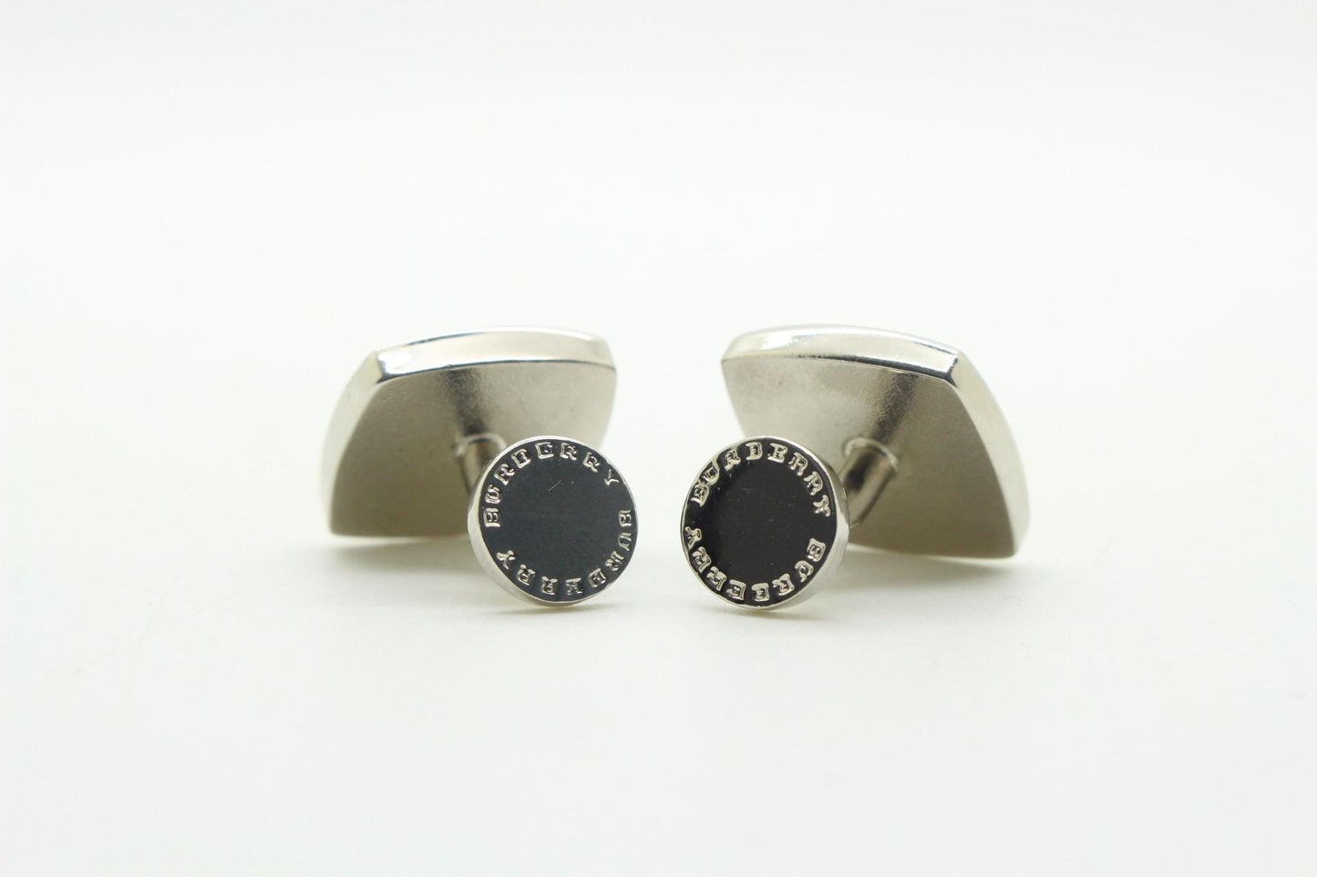 Burberry vintage square cuff links made in England. Solid metal with red enamel. Signature check on one side, plain on the other. NOS