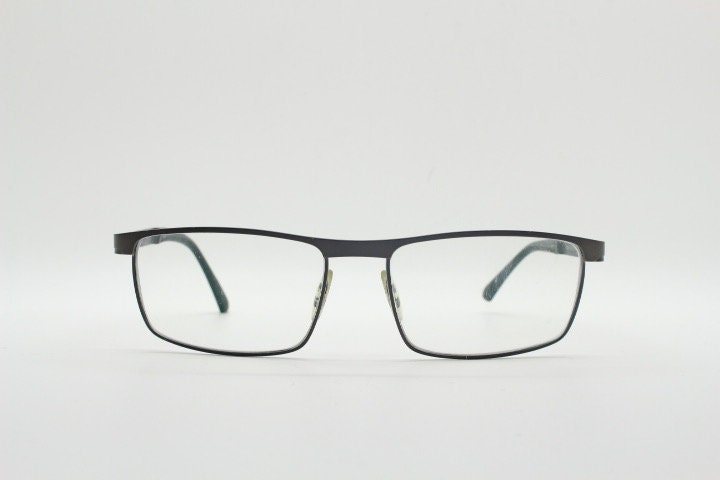 Porsche design rectangular eye glasses model 8251 made in Japan. Minimal gunmetal grey wire optical frame. Prescription RX spectacles
