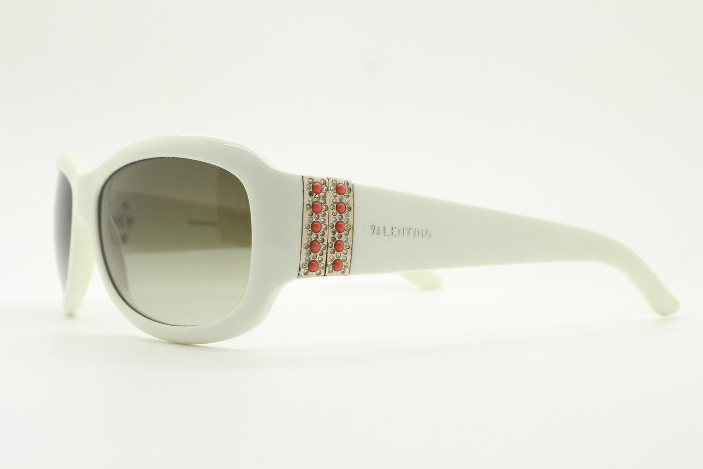 Valentino Y2k vintage wrap around bug eye sunglasses. Curving white acetate shield frame with orange and diamante stones. 2000s. Rhinestone