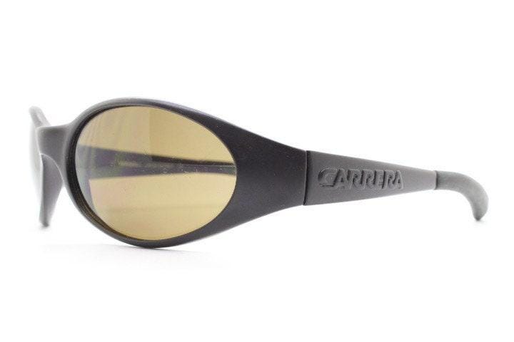 Carrera 90s vintage shield sunglasses made in Italy. Aerodynamic brown wrap around sport frame with big spell out logo. Bug eye. BNWT. NOS