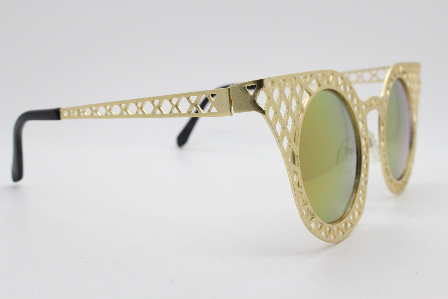 Y2K vintage metal cat eye sunglasses. Women's gold cut out lattice scaffold cateye frame with goldburst mirror lenses. 2000s. BNWT