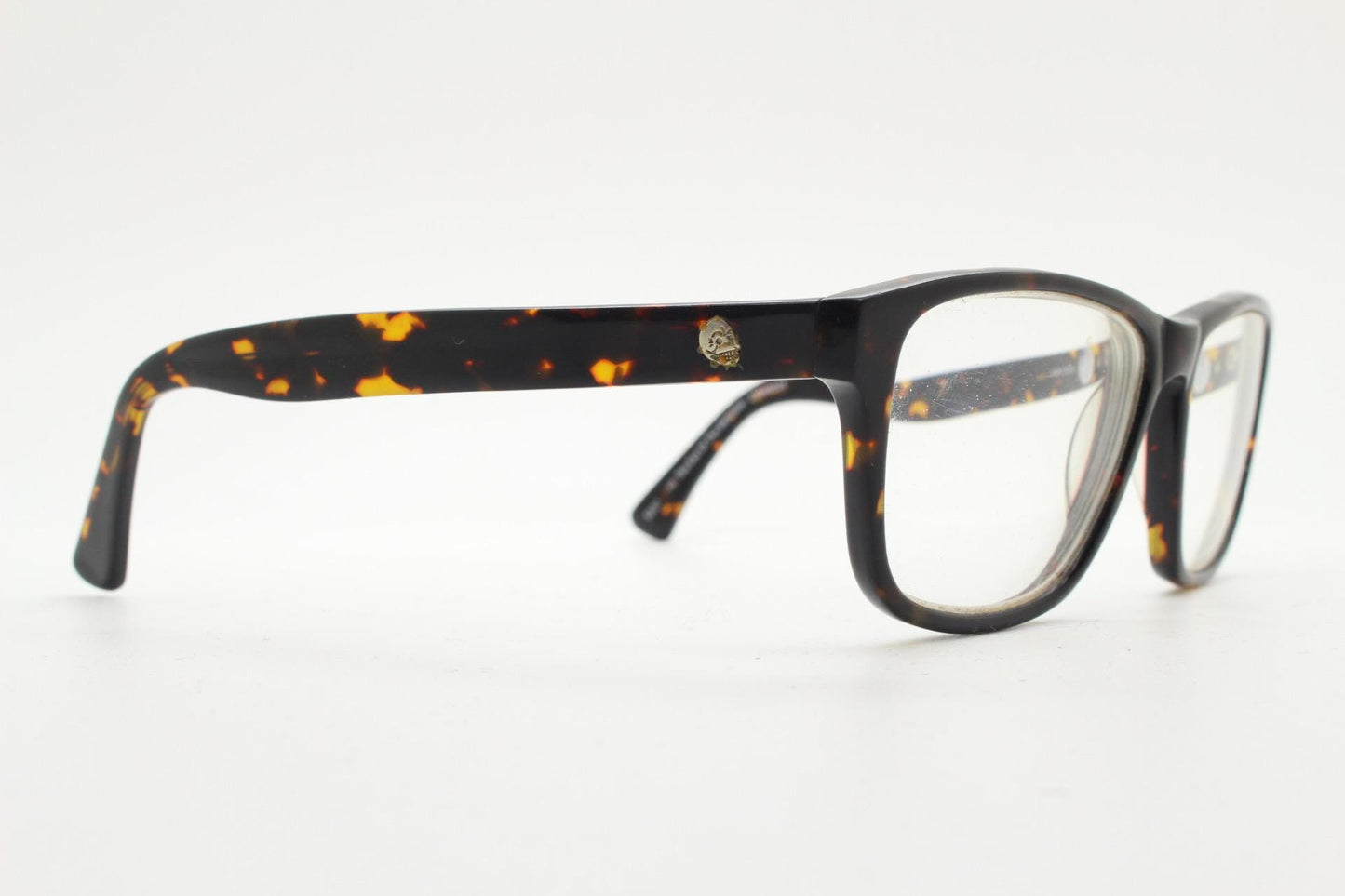 Cheap Monday rectangular low profile eye glasses. Dark brown tortoise gloss finish acetate optical frames. Prescription RX spectacles