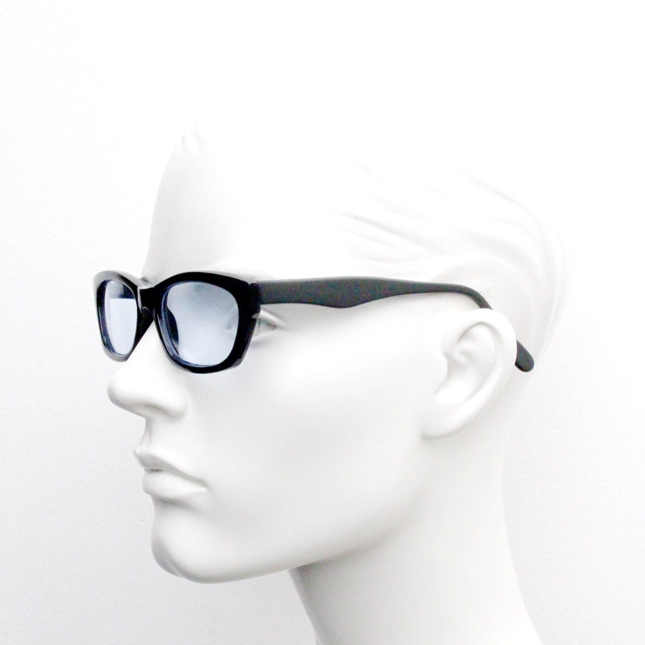 80s vintage rectangular sunglasses. Low profile 60s design black gloss frame with extra light tone sky blue lenses. BNWT Unused NOS