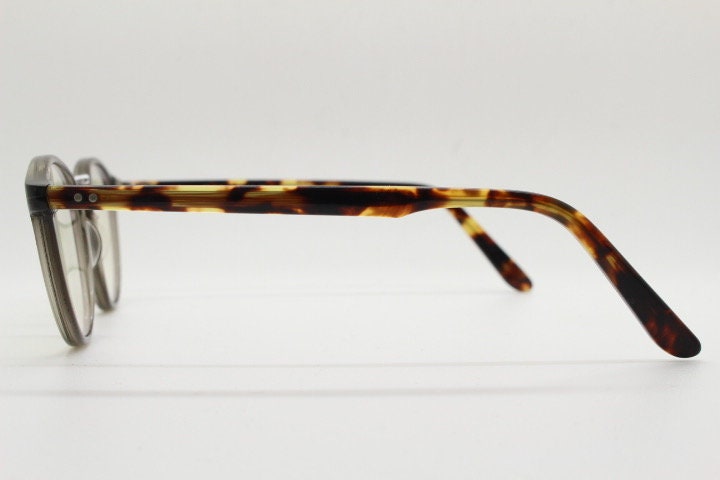 Yellows plus round eye glasses made in Japan. Tortoise 30s design acetate optical frame. Prescription eyeglasses. RX vintage