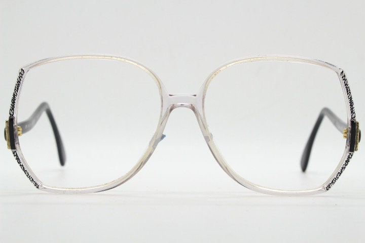 Silhouette 80s vintage hexagon eye glasses made in Austria. Dynamic transparent crystal optical frame with abstract pattern. Prescription RX