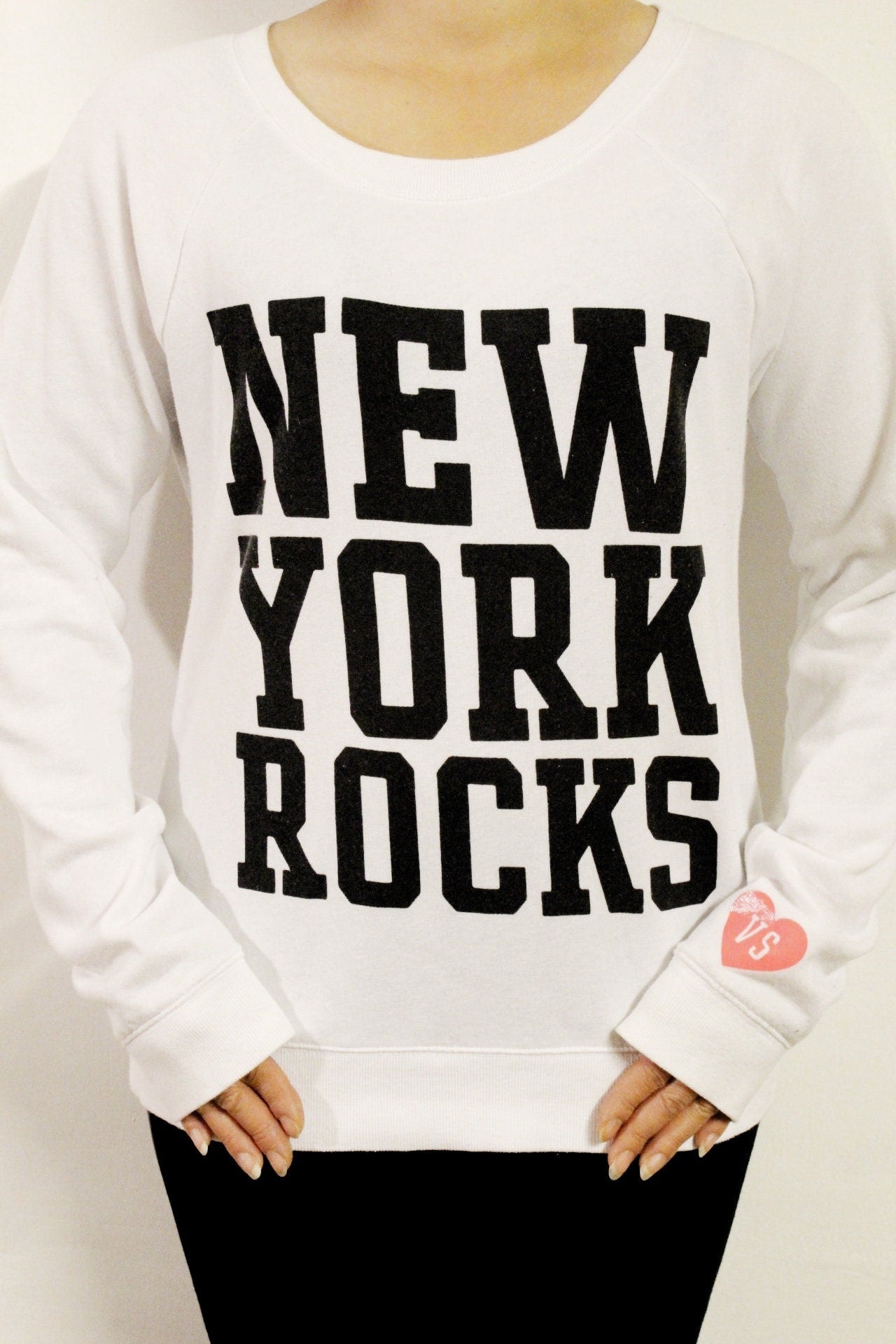 Victorias Secret white sweatshirt. "New York Rocks" print on long sleeve round neck sweater. Womens crew neck pullover