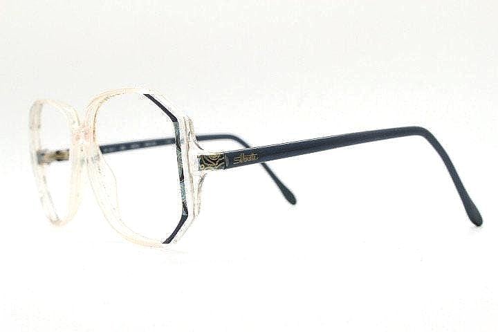 Silhouette 80s vintage hexagon eye glasses made in Austria. Transparent crystal optical frame with abstract blue pattern. Prescription. 70s
