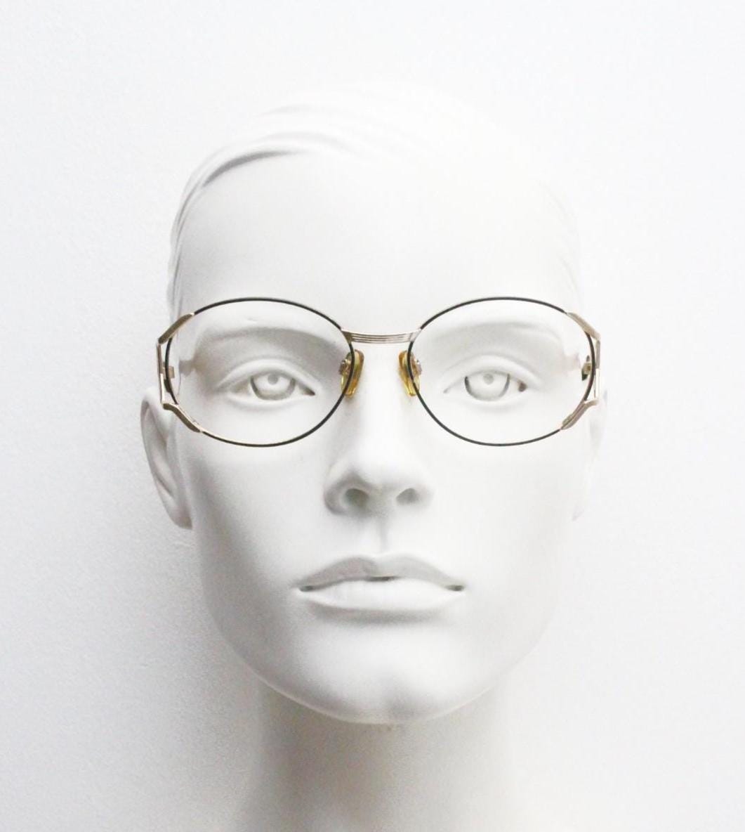 Yves Saint laurent 90s vintage large oval eye glasses made in Italy with incredible zig zag arm design. YSL Prescription RX spectacles