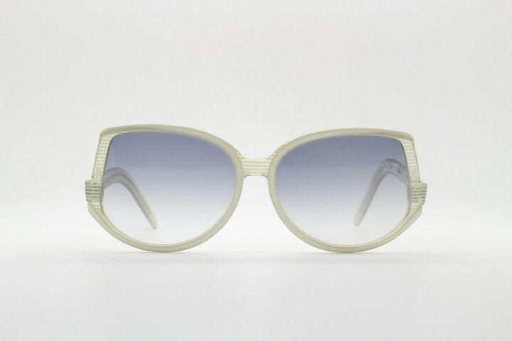 Silhouette 70s vintage abstract upside down sunglasses model 3018 made in Austria. Dynamic grey pearlised acetate frame with white stripes