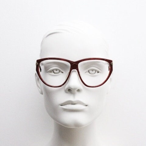 Silhouette 80s vintage oversized cat eye glasses made in Austria. Dramatic red prescription optical frame with subtle criss cross stripes RX