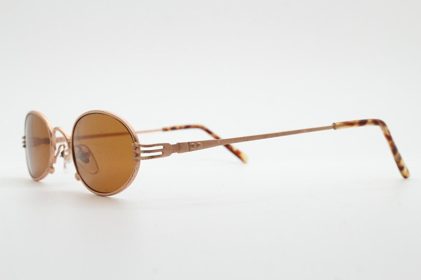 90s oval vintage metal sunglasses. Minimal small satin finish gold metal micro frame with brown lenses. Steampunk. Unused NOS