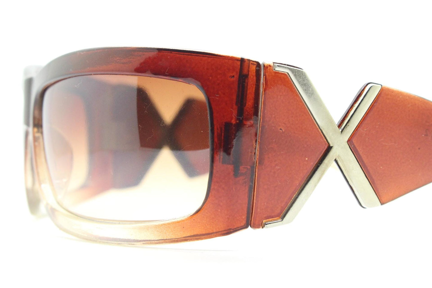 Y2K vintage big wrap around sunglasses. Transparent brown shield design with hot graduating lenses and big X crest. 2000s bug eye. NOS