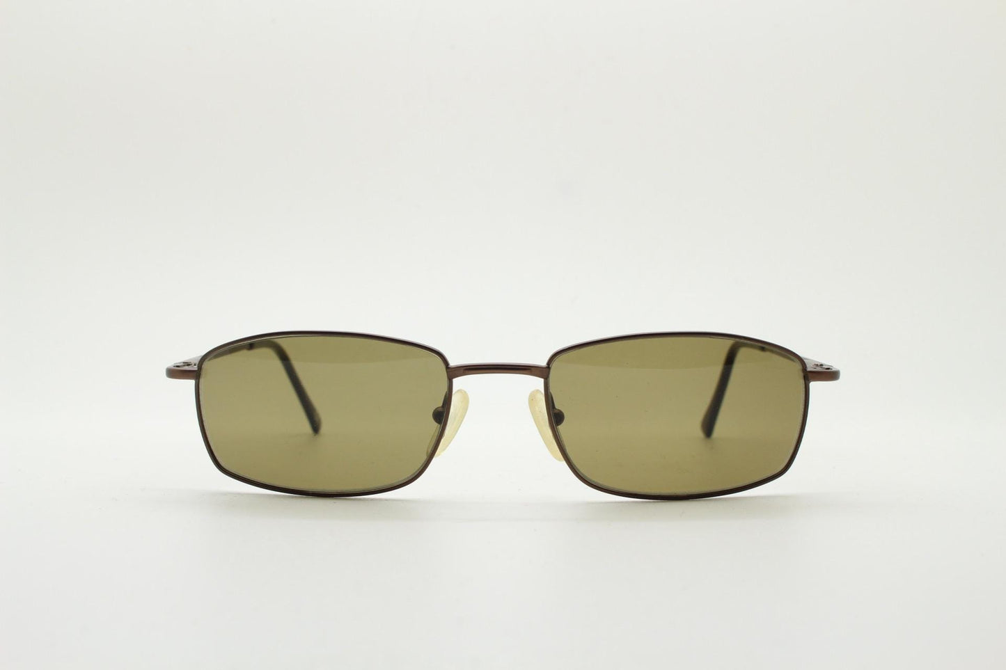 90s vintage rectangular low profile metal sunglasses. Minimal slim metal frame in satin bronze finish with plain brown lenses. NOS. BNWT