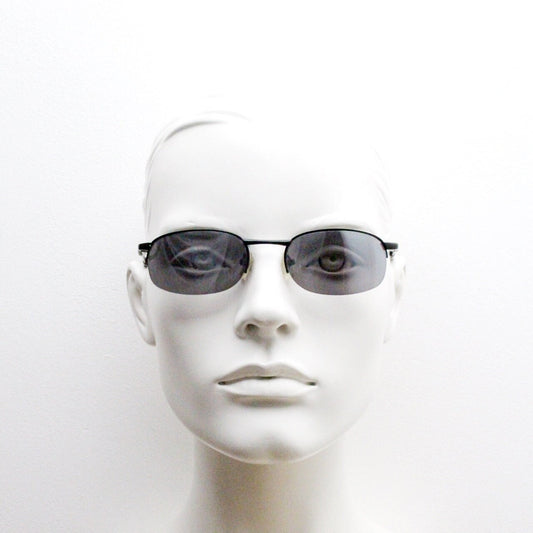 90s vintage small oval black sunglasses. Satin finish half frame with grey lenses and slight mirror glaze. 2000's. Y2K. Unused NOS