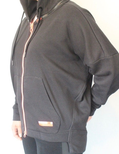 Stella Mc Cartney for Adidas Stellasport vintage zipper hoody. Black batwing track top with pink double zip detachable hood and tail section
