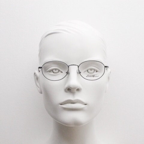 Eddie Bauer 90s vintage oval eye glasses.Grey matt finish optical frames with subtle brown trim. Prescription RX spectacles. NOS