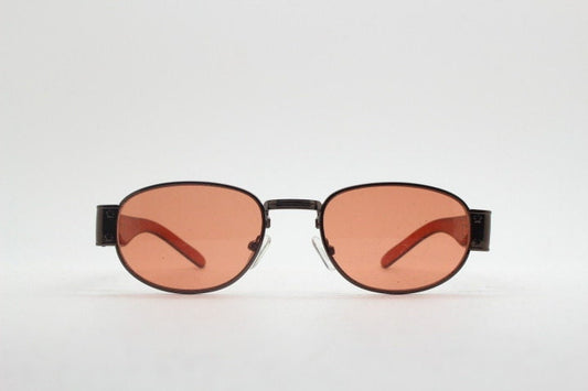 90s vintage low profile sunglasses. Brown chrome frame with thick transparent amber arms and orange lenses. Unused. BNWT