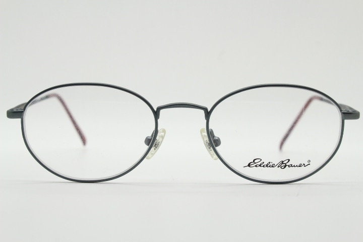 Eddie Bauer 90s vintage oval eye glasses.Grey matt finish optical frames with subtle brown trim. Prescription RX spectacles. NOS