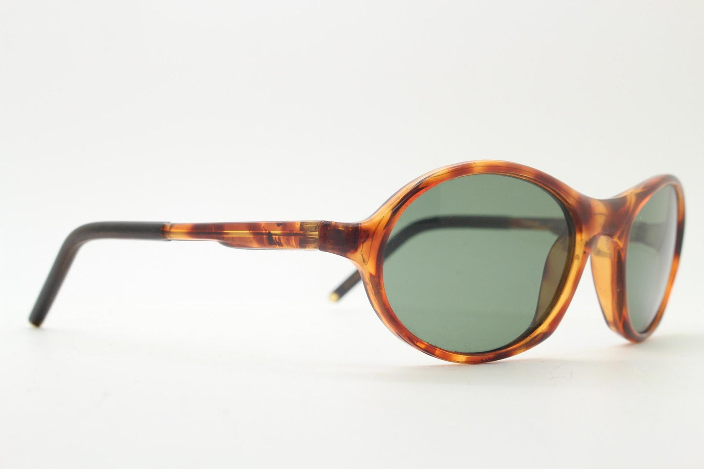 90s vintage oval small bug eye sunglasses. Tortoise gloss frame with quality real green glass lenses