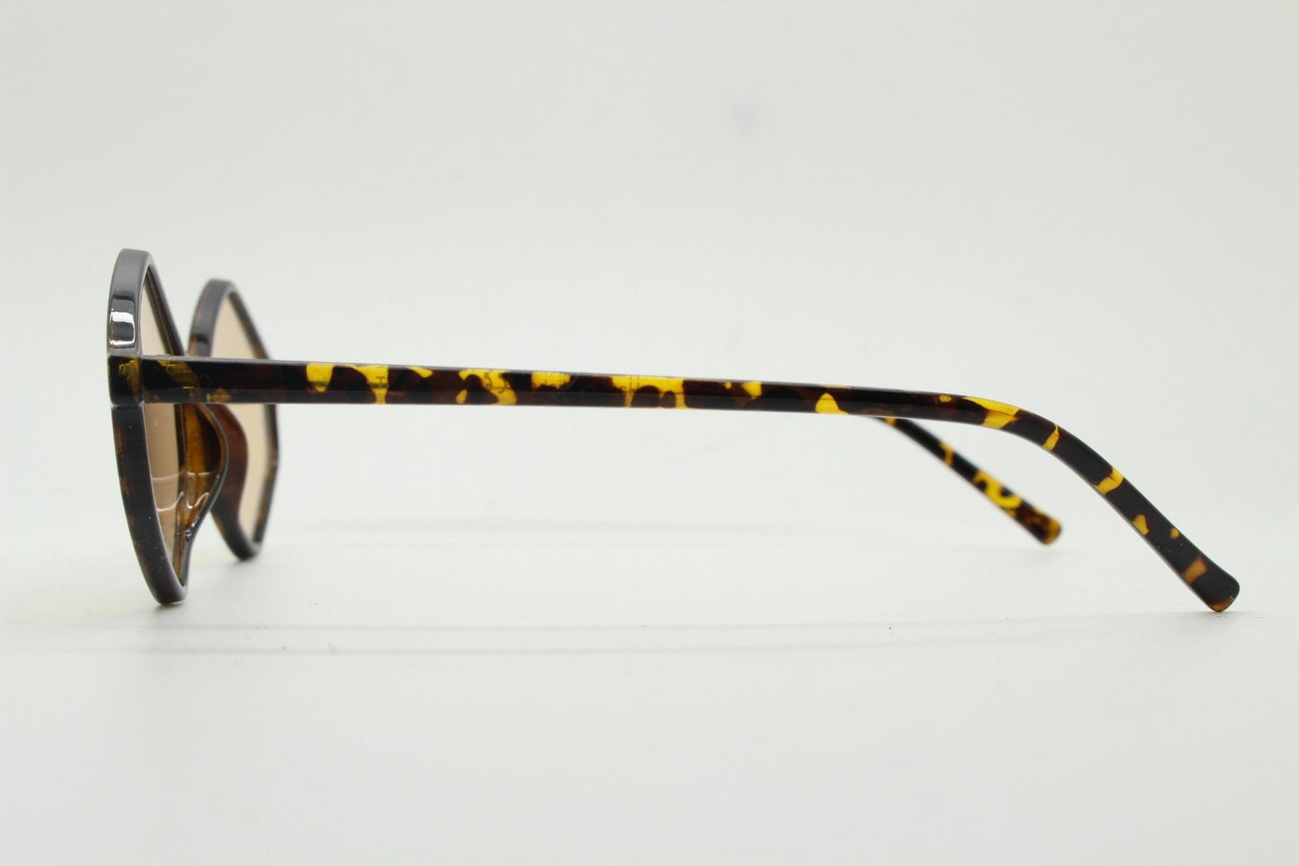 90s vintage diamond hexagon sunglasses. Atmospheric 6 sided tortoise gloss frame with very light tone brown lenses. Unused NOS