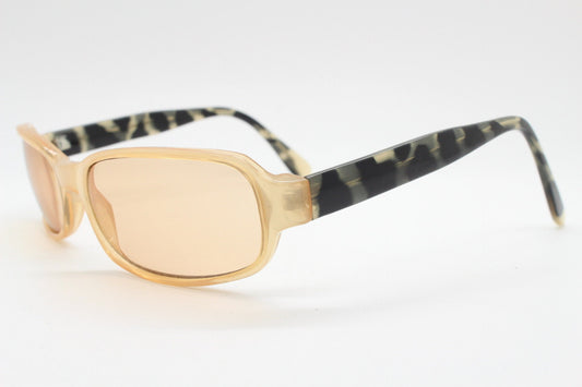 Y2K vintage curved rectangular sunglasses. Beige frame with matching lenses and contrasting tortoise arms. 2000s unused NOS. 00s