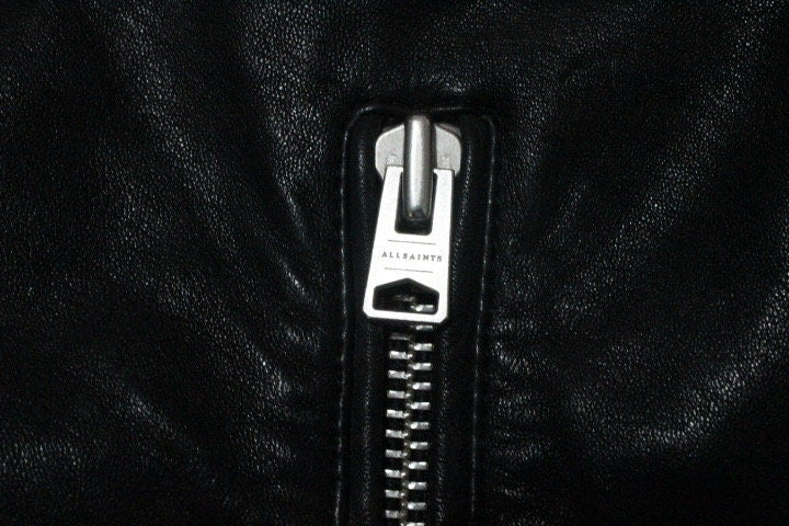 Allsaints black motorcycle jacket with. Genuine lambs leather hip length biker with fixed adjustable belt. BNWOT. Over 30% sale rrp 469 GBP