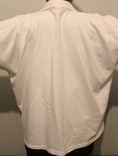 80s Vintage oversized polo shirt with 'LOVE ME' graphic print. Crop sleeve jumper. Unisex sweatshirt. Fashion grail sweater. NOS pullover