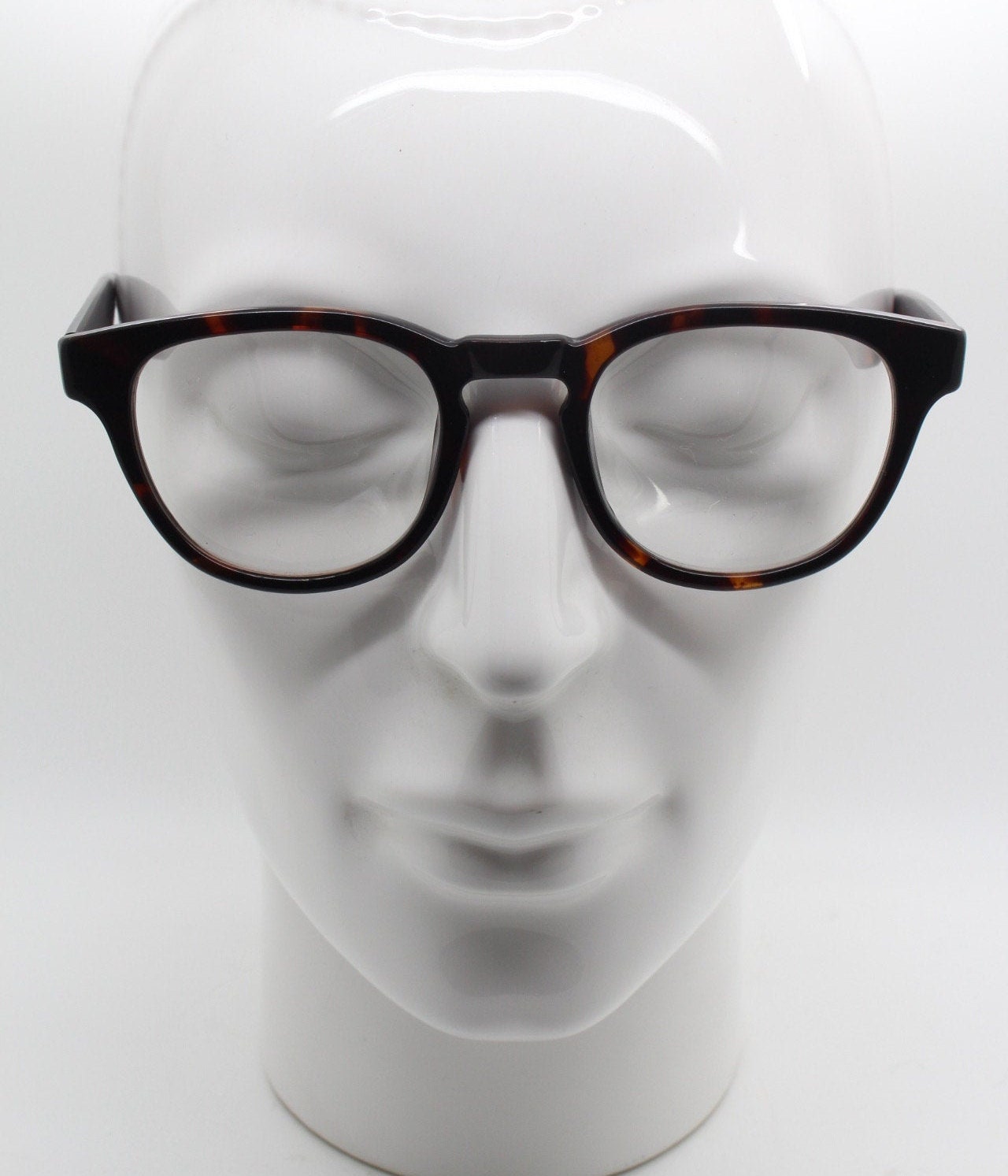 80s vintage modified wayfarer style glasses. Tortoise optical frames with keyhole bridge and clear lenses. 40s, 50s style NOS eyeglasses