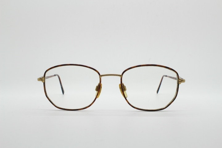 Giorgio Armani 90s vintage angular squared eye glasses made in Italy. Subtle metallic satin tiger print optical frames. Prescription RX