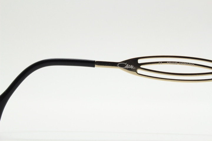 Cazal 90s vintage angular eye glasses made in Germany. Low profile crystal optical frames with detailed arms. Prescription eyeglasses. RX