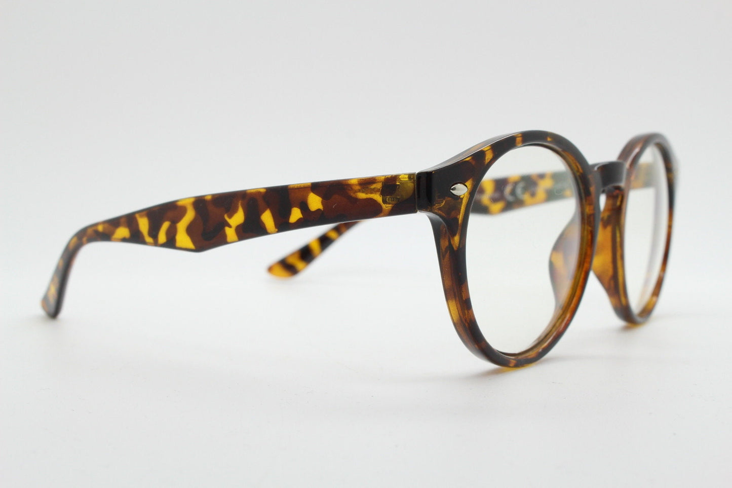 90s vintage round eye glasses. Tortoise gloss 40s design optical frame with keyhole bridge and clear lenses. Prescription RX Spectacles