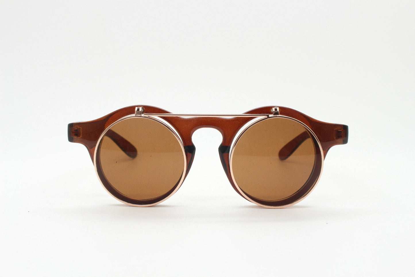Vintage 90s round flipper sunglasses. 30s style brown frame with clear lenses and flip up sunglasses visor. BNWT unused