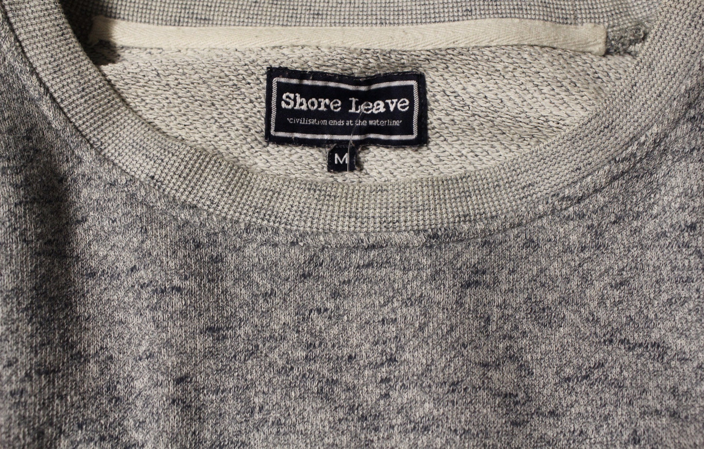 Shore Leave grey fleck long sweatshirt. Crew neck pullover with outside chest pocket. Pure cotton round neck mens jumper