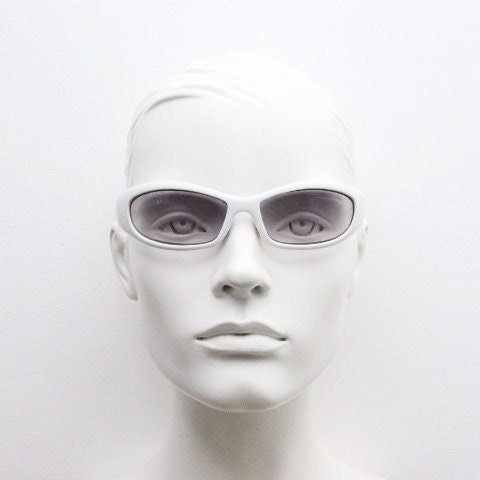 Y2k vintage wrap around bug eye sunglasses. Curving ice white shield frame with light tone lenses. Rave. Super hero cosplay 2000s NOS