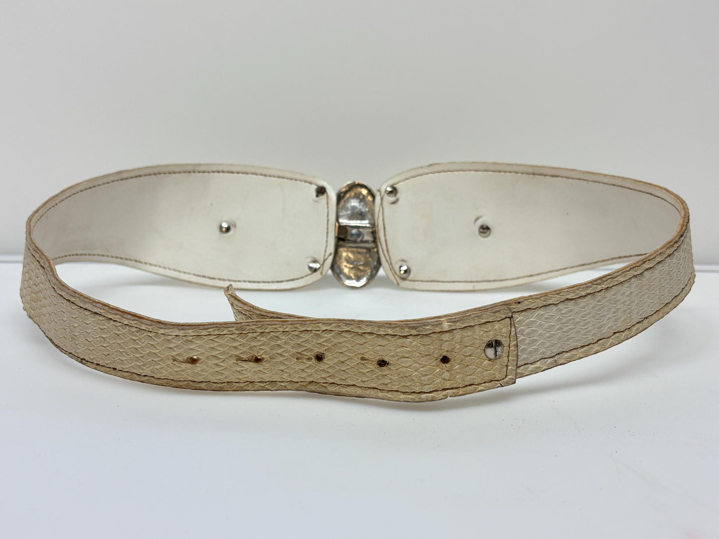 80s vintage womens white textured vinyl flattering dress belt with substantial butterfly shape metal buckle with brass implants