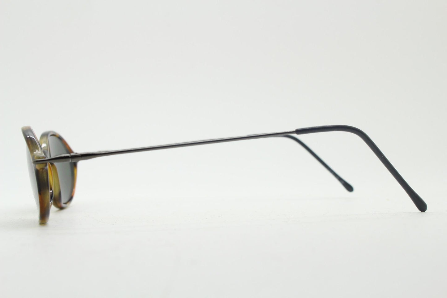 90s vintage oval sunglasses. Honey tortoise frame with refined slim 'industrial tech' style arms. Micro. Unused NOS