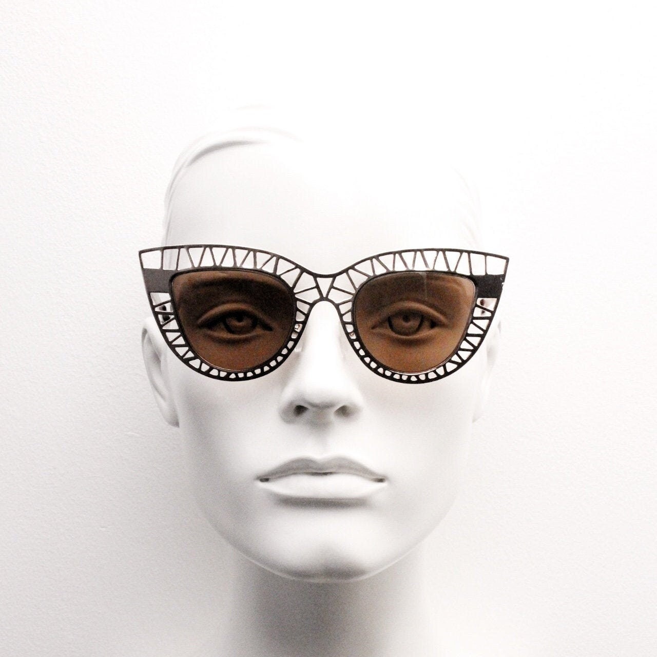 Y2K vintage metal cat eye sunglasses.  Women's extraordinary gold cut out lattice scaffold cateye frame with brown lenses. 2000s. BNWT