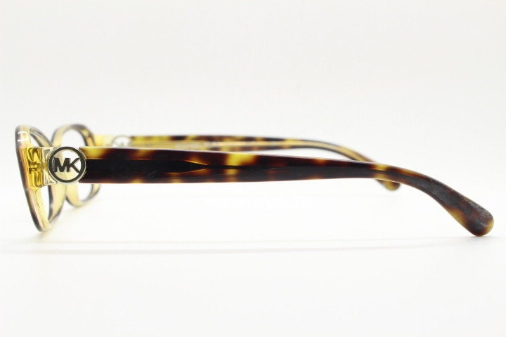 Michael Kors vintage rectangular eye glasses. Tortoise layered acetate low profile cateye optical frame. Womens prescription spectacles