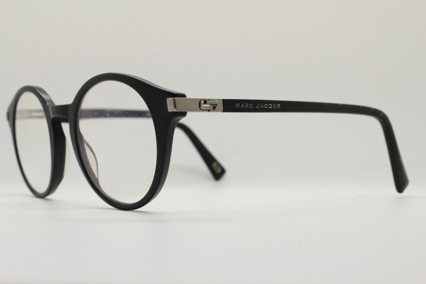 Marc Jacobs round eye glasses in plain black satin finish acetate. Strong fashion look optical frames. Prescription RX spectacles