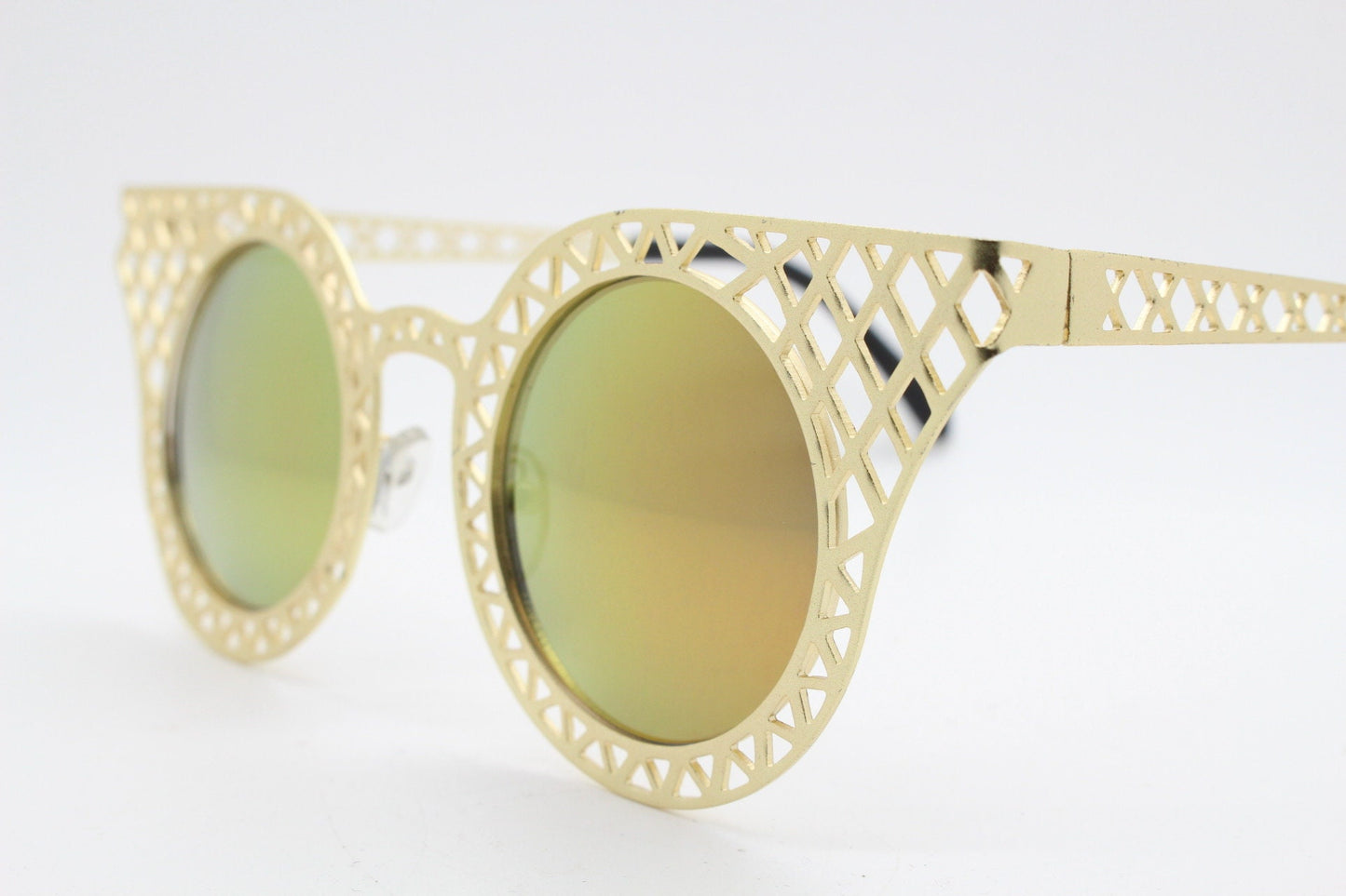 Y2K vintage metal cat eye sunglasses. Women's gold cut out lattice scaffold cateye frame with goldburst mirror lenses. 2000s. BNWT