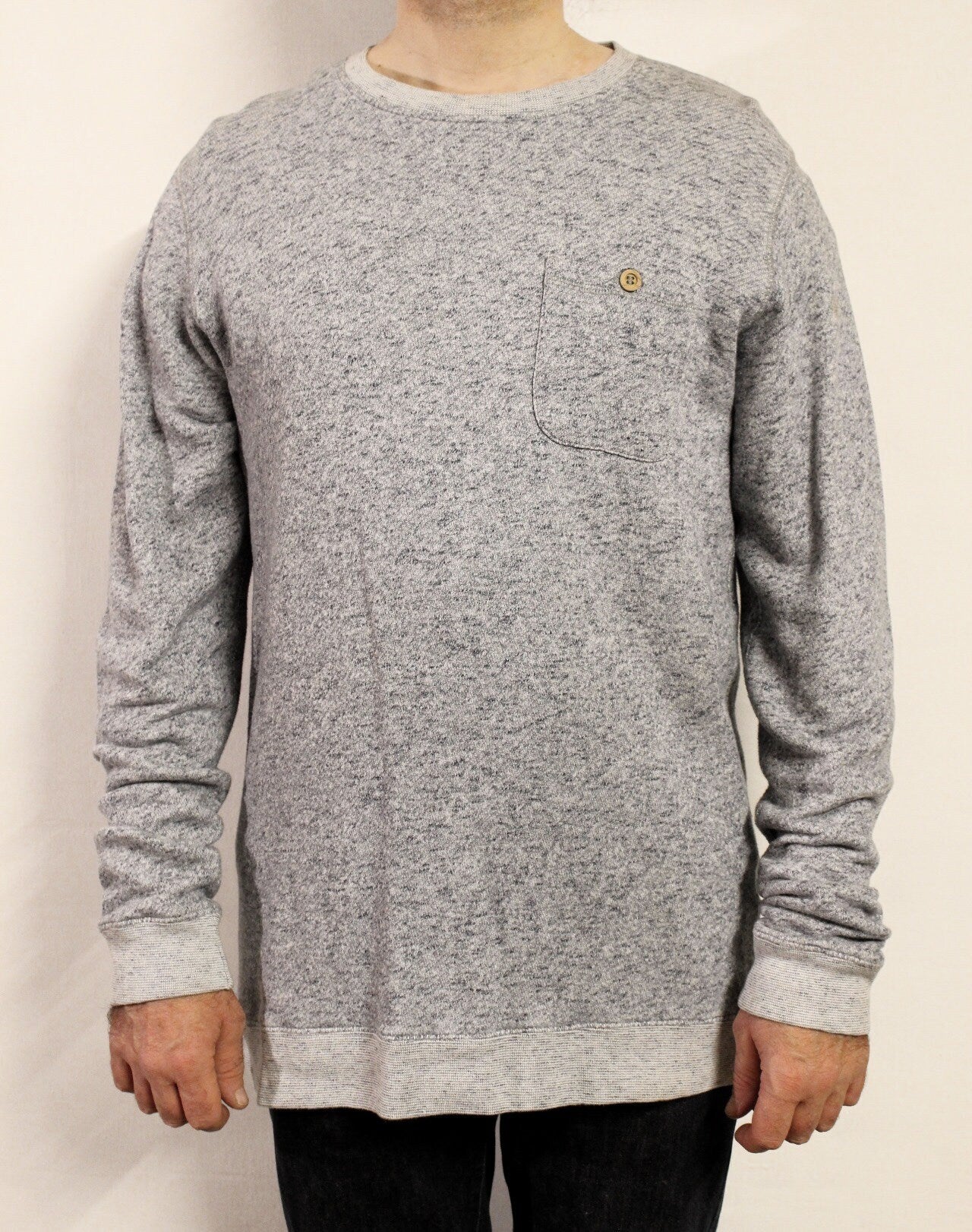 Shore Leave grey fleck long sweatshirt. Crew neck pullover with outside chest pocket. Pure cotton round neck mens jumper