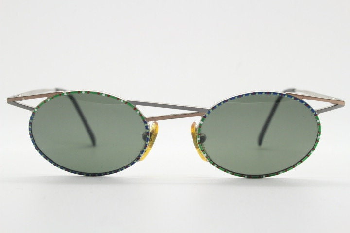 Taxi 90s vintage oval sunglasses. Unique innovative abstract design with extraordinary multi colour print. Casanova