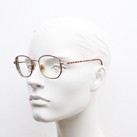 Giorgio Armani 90s vintage angular squared eye glasses made in Italy. Subtle metallic satin tiger print optical frames. Prescription RX